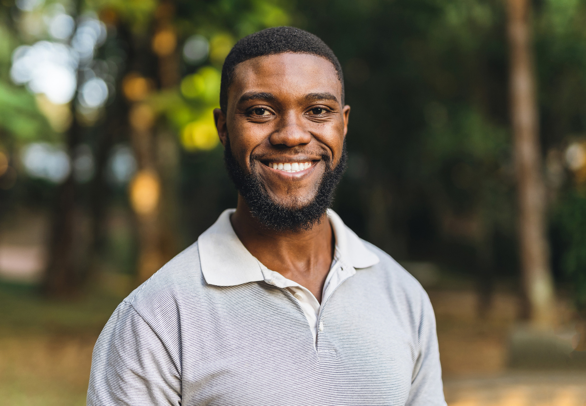 smiling in polo