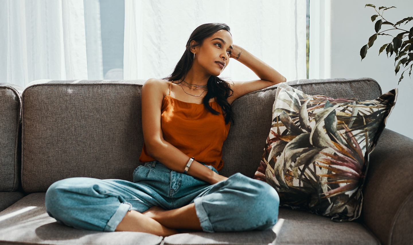 sitting lazily on couch